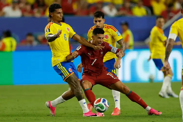 En un partidazo con final polémico, Colombia empata con Portugal y es líder de grupo