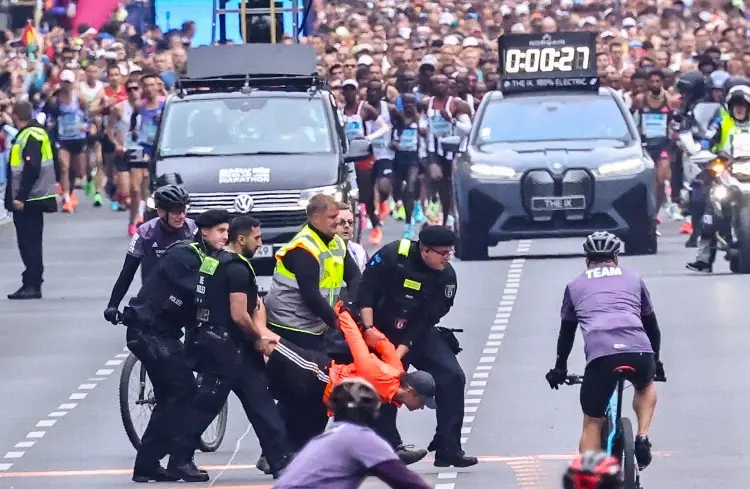 Policía impide boicot de ambientalistas en el Maratón de Berlín (VIDEO)